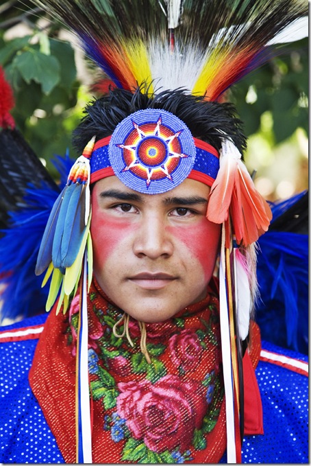 Elliot Tsoodle, a Navajo-Kiowa from Albuquerque, prepares to participate in the Native AMerican Costume Contest at the 2009 Santa Fe Indian Market.