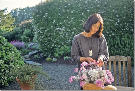 Gardener and designer Sarah Hammond works in the early morning in her garden retreat in Bolinas